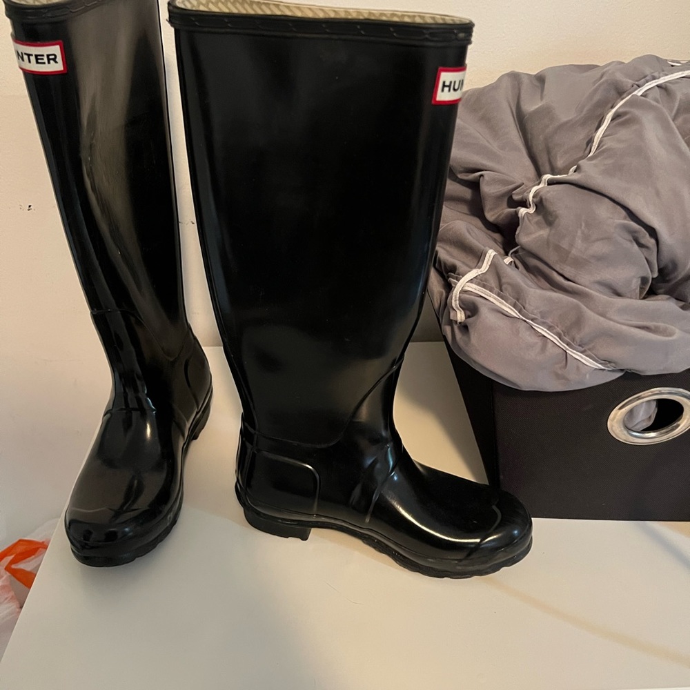 Glossy black hunter boots